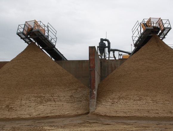 Two-washed-sand-stockpiles-at-Creagh-from-lane